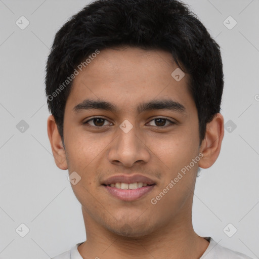 Joyful latino young-adult male with short  black hair and brown eyes