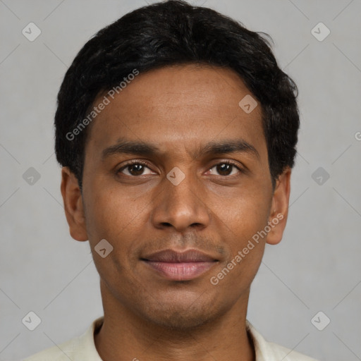 Joyful latino young-adult male with short  black hair and brown eyes