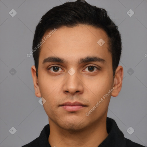 Neutral latino young-adult male with short  black hair and brown eyes