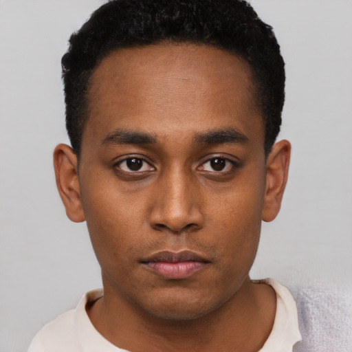 Neutral black young-adult male with short  black hair and brown eyes
