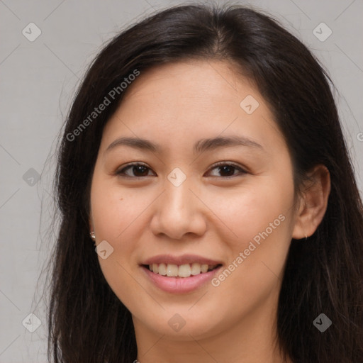 Joyful asian young-adult female with long  brown hair and brown eyes