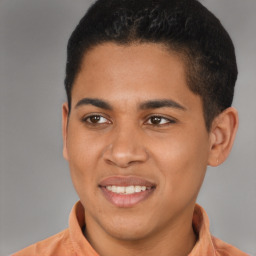 Joyful latino young-adult male with short  brown hair and brown eyes