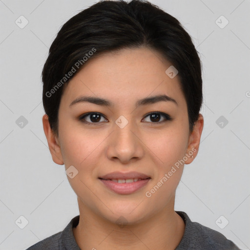 Joyful asian young-adult female with short  black hair and brown eyes