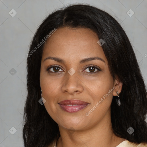 Joyful black young-adult female with long  brown hair and brown eyes