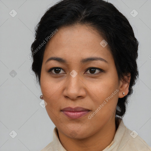 Joyful latino adult female with medium  brown hair and brown eyes