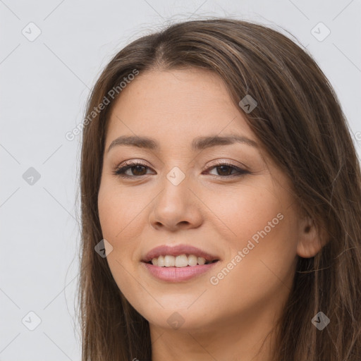 Joyful white young-adult female with long  brown hair and brown eyes