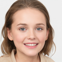 Joyful white young-adult female with medium  brown hair and blue eyes