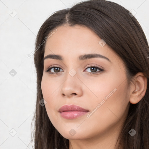 Neutral white young-adult female with long  brown hair and brown eyes