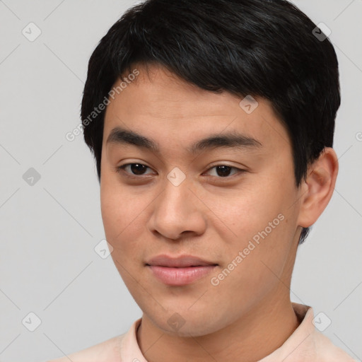 Joyful asian young-adult male with short  black hair and brown eyes