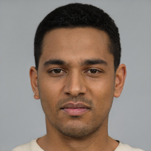 Neutral black young-adult male with short  black hair and brown eyes