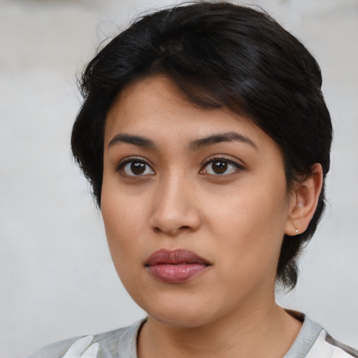 Neutral latino young-adult female with medium  brown hair and brown eyes