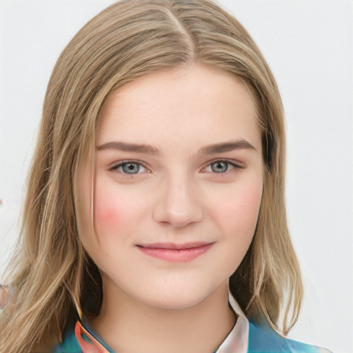 Joyful white young-adult female with long  brown hair and blue eyes