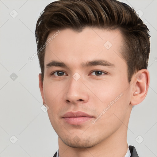 Neutral white young-adult male with short  brown hair and brown eyes