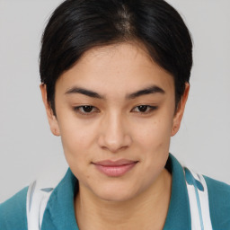 Joyful asian young-adult female with short  brown hair and brown eyes