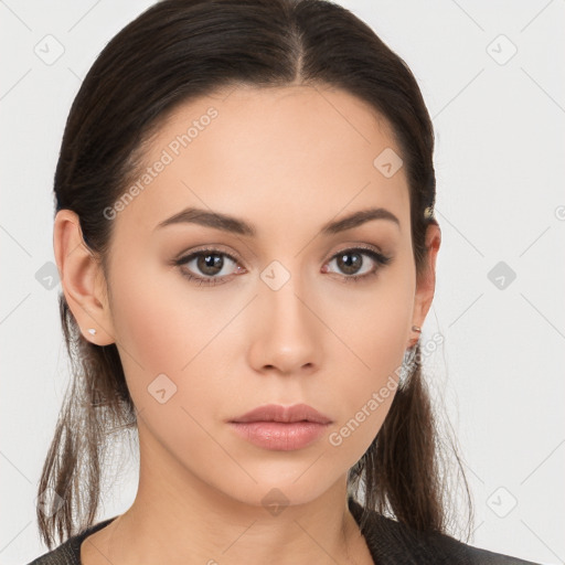 Neutral white young-adult female with long  brown hair and brown eyes