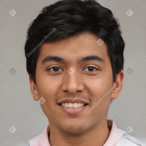 Joyful asian young-adult male with short  black hair and brown eyes