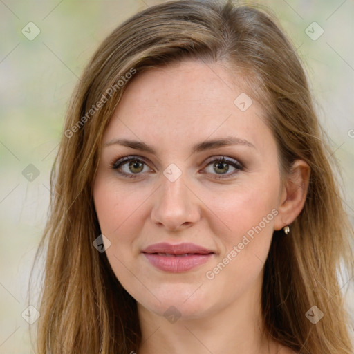 Joyful white young-adult female with long  brown hair and green eyes