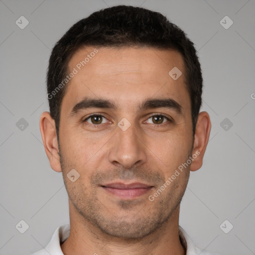 Joyful white young-adult male with short  brown hair and brown eyes