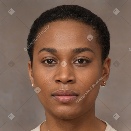 Joyful black young-adult female with short  brown hair and brown eyes