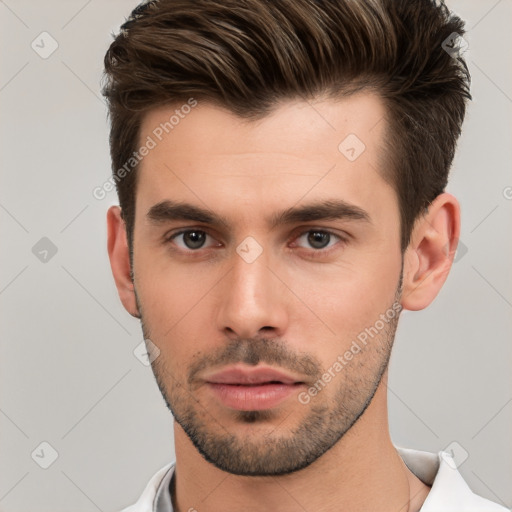 Neutral white young-adult male with short  brown hair and brown eyes