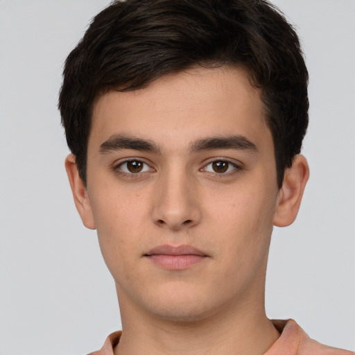 Neutral white young-adult male with short  brown hair and brown eyes