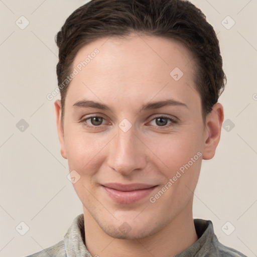 Joyful white young-adult female with short  brown hair and grey eyes