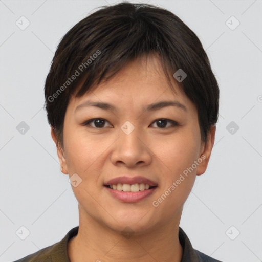 Joyful asian young-adult female with short  brown hair and brown eyes