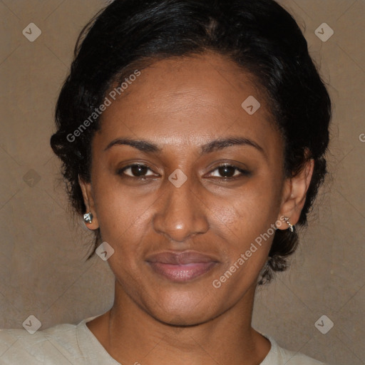Joyful black young-adult female with medium  brown hair and brown eyes