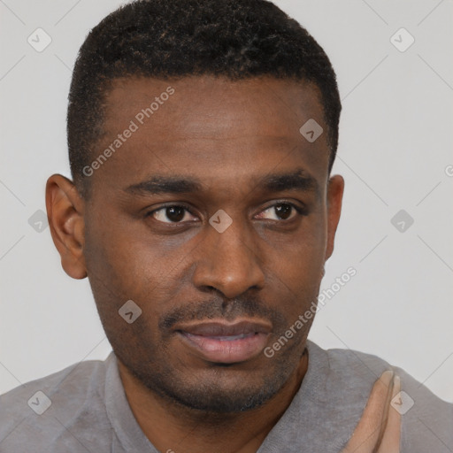 Neutral black young-adult male with short  brown hair and brown eyes