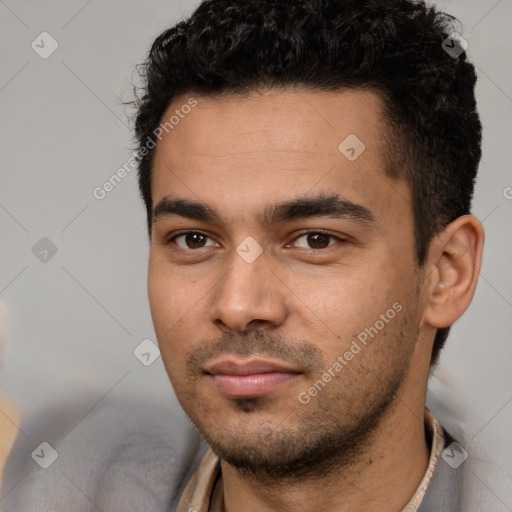 Neutral white young-adult male with short  black hair and brown eyes