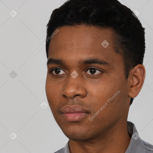 Neutral black young-adult male with short  black hair and brown eyes