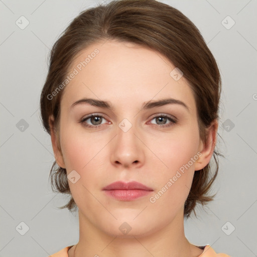 Neutral white young-adult female with medium  brown hair and brown eyes