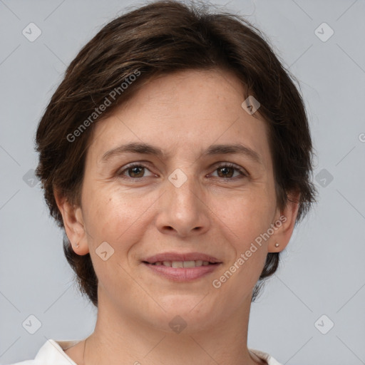 Joyful white adult female with short  brown hair and brown eyes