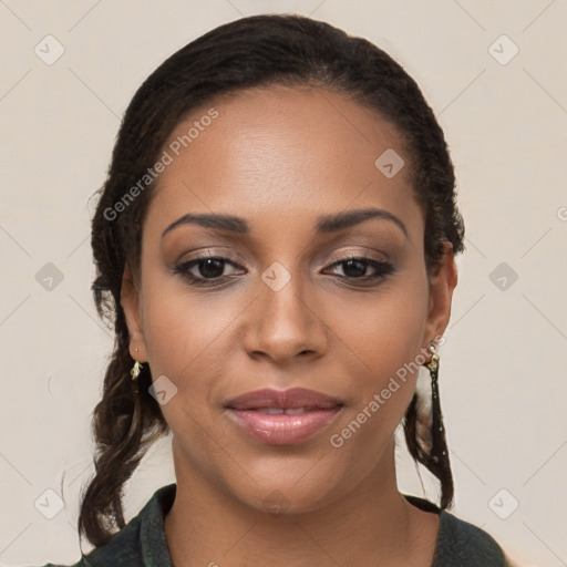 Joyful black young-adult female with long  brown hair and brown eyes