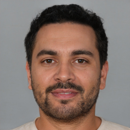 Neutral white young-adult male with short  black hair and brown eyes