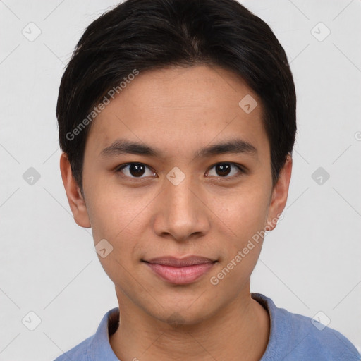 Joyful asian young-adult male with short  brown hair and brown eyes