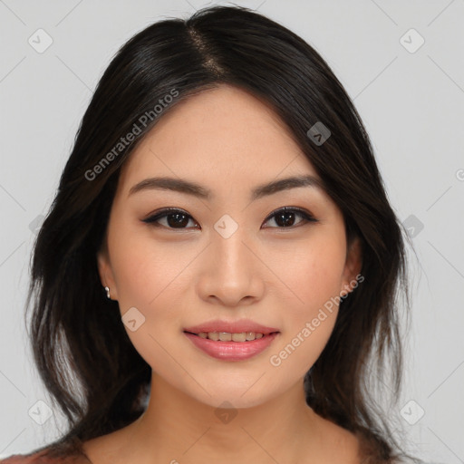 Joyful asian young-adult female with medium  brown hair and brown eyes