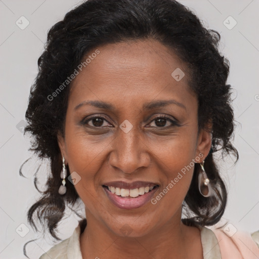 Joyful latino adult female with medium  brown hair and brown eyes