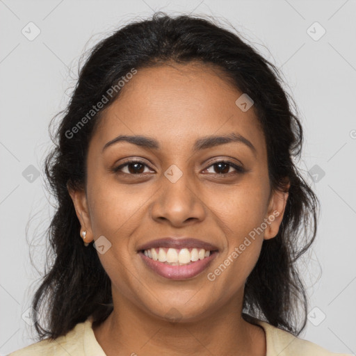 Joyful latino young-adult female with long  brown hair and brown eyes