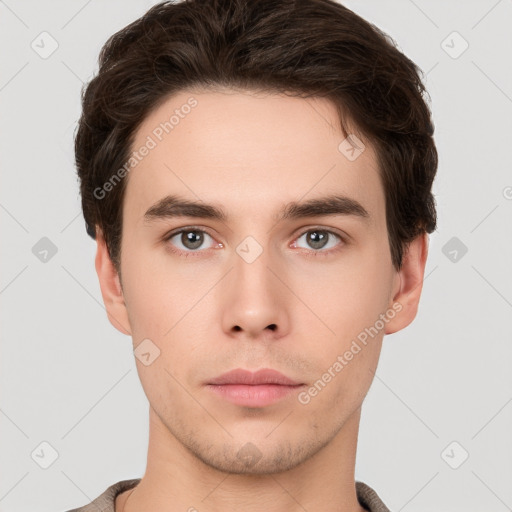 Neutral white young-adult male with short  brown hair and brown eyes