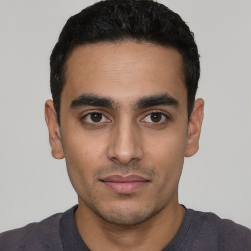 Neutral latino young-adult male with short  black hair and brown eyes