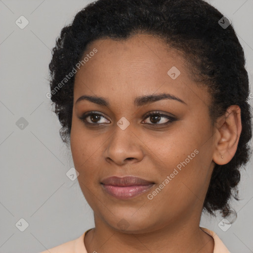 Joyful black young-adult female with medium  black hair and brown eyes