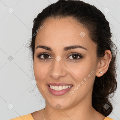 Joyful white young-adult female with long  brown hair and brown eyes