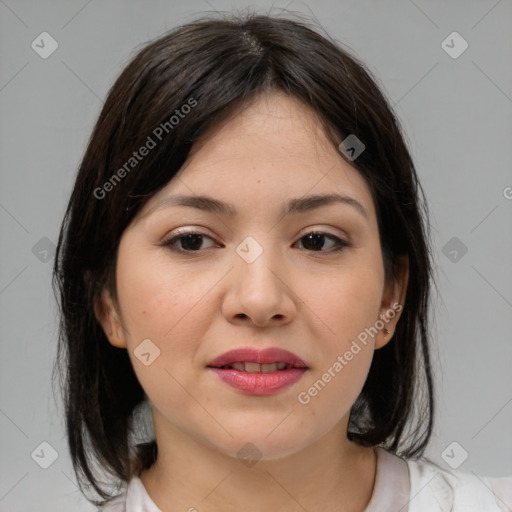 Joyful asian young-adult female with medium  brown hair and brown eyes