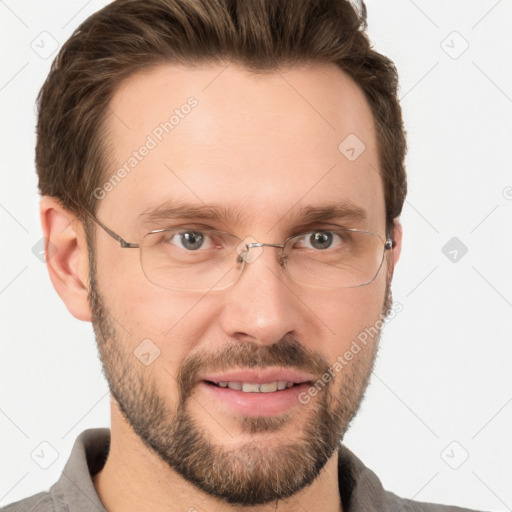 Joyful white adult male with short  brown hair and grey eyes