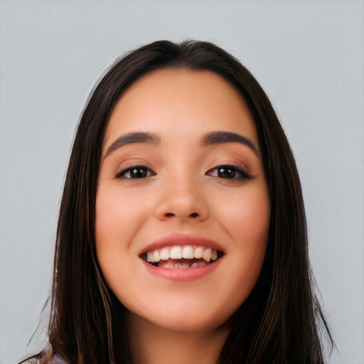 Joyful white young-adult female with long  black hair and brown eyes