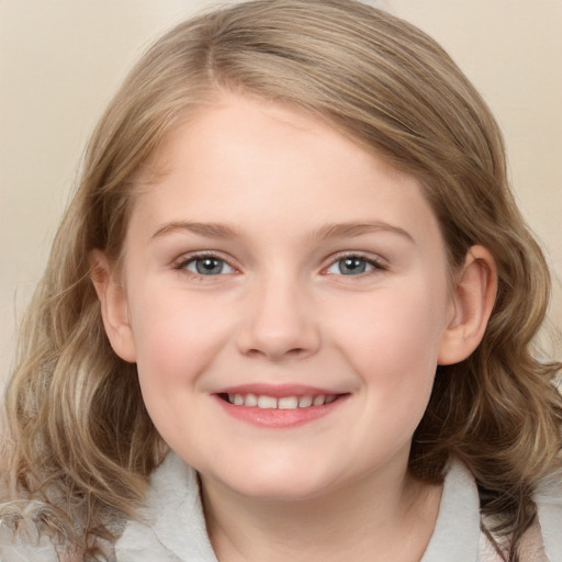 Joyful white child female with medium  brown hair and grey eyes