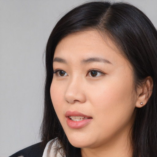 Neutral asian young-adult female with long  black hair and brown eyes