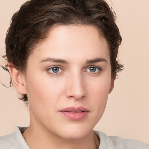 Neutral white young-adult female with short  brown hair and brown eyes