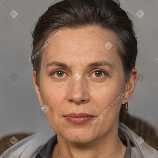 Joyful white adult female with short  brown hair and brown eyes